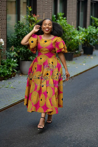 Adesua Brown And Pink Dress