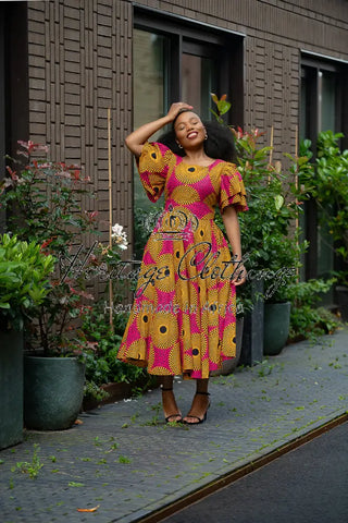 Adesua Brown And Pink Dress