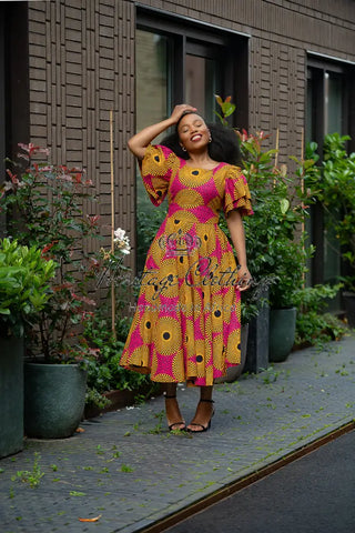 Adesua Brown And Pink Dress