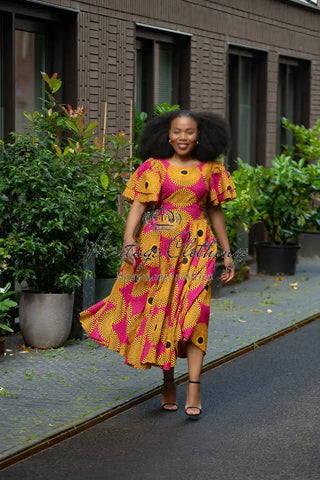 Adesua Brown And Pink Dress